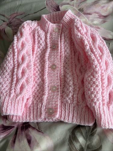 Hand knitted baby girl - hand, pink