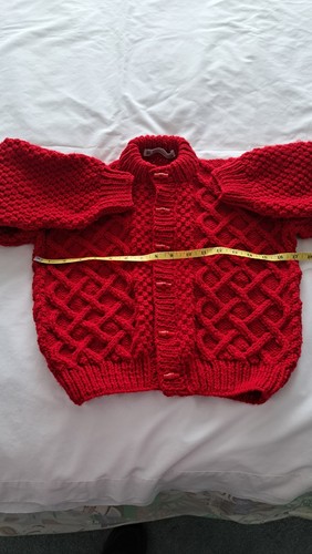 Hand knitted aran - hand,