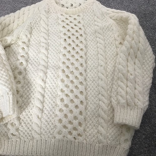Hand knitted traditional aran - hand,