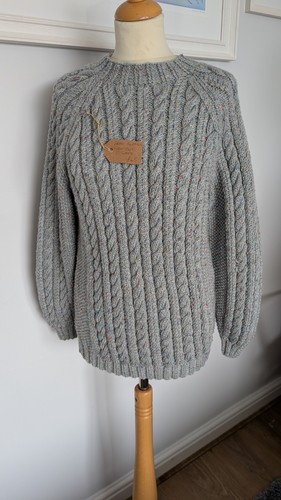 Hand knitted aran - hand,