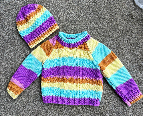 Hand knitted baby - hand,