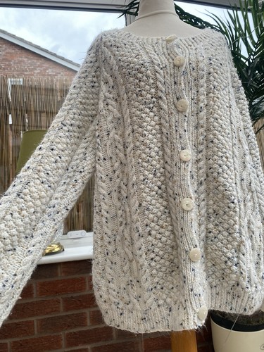 Hand knitted cream fleck aran - hand,