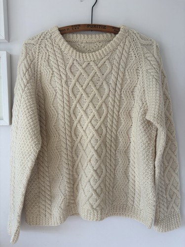 Hand knitted aran wool cream - hand,