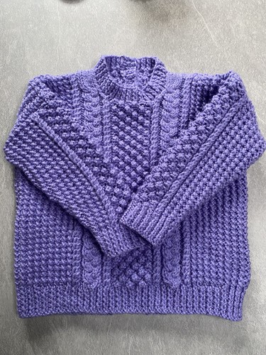 Hand knitted aran - hand,