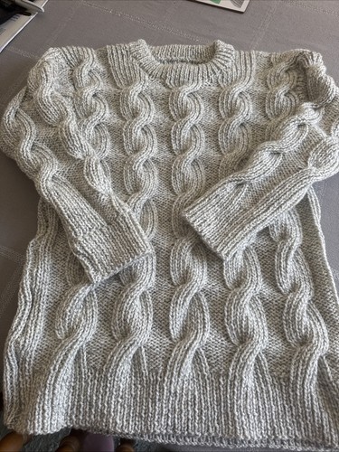 Hand knitted aran - hand,