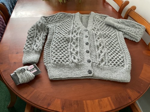 Hand knitted aran neck - hand, v