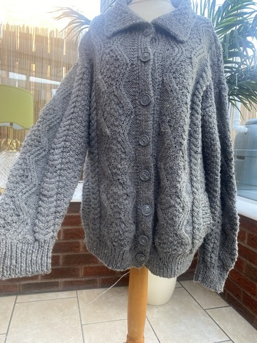 Hand knitted aran wool - hand,
